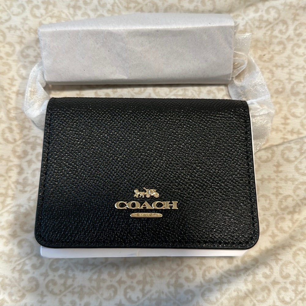 Brand new coach wallet on a chain